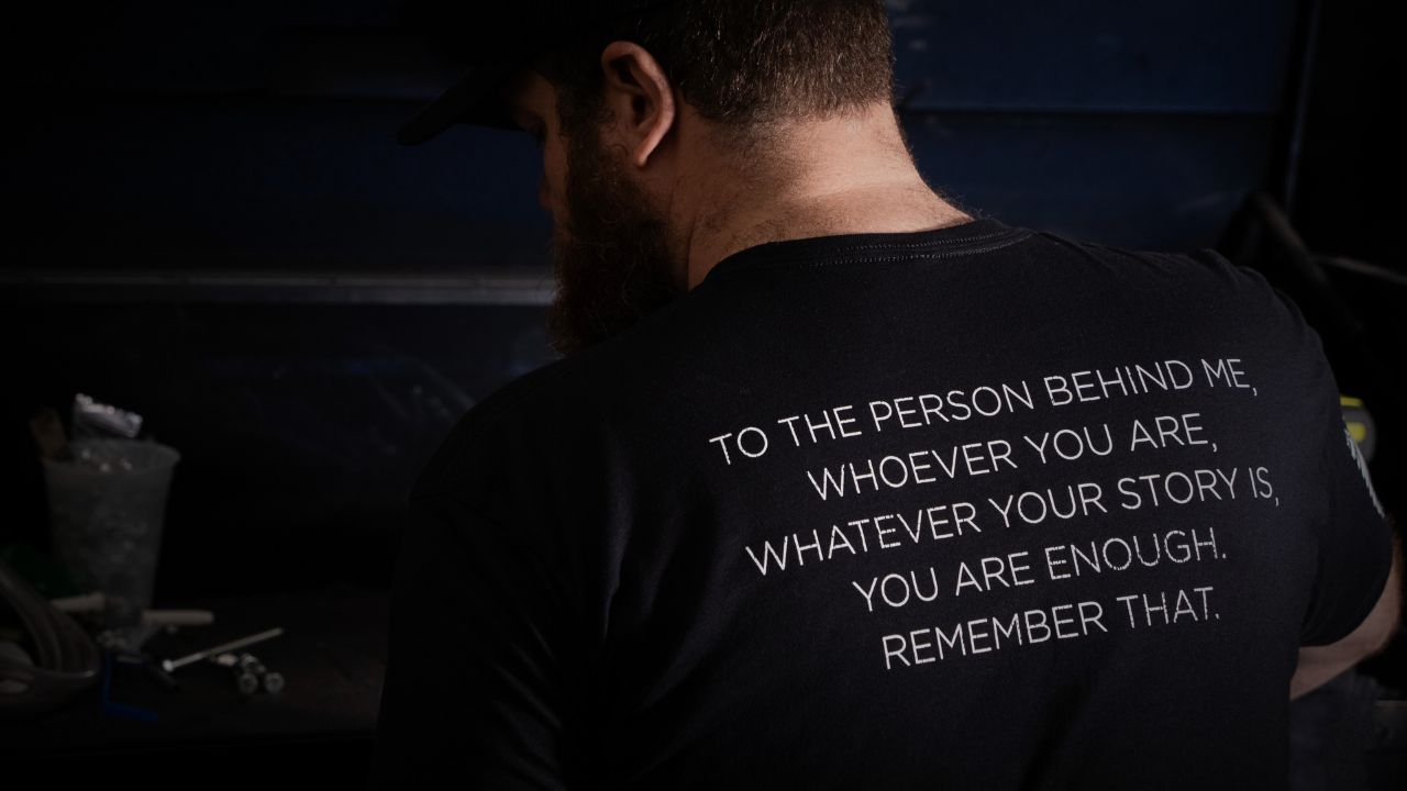 The Power of a Simple Message: Our 'To the Person Behind Me' Tee