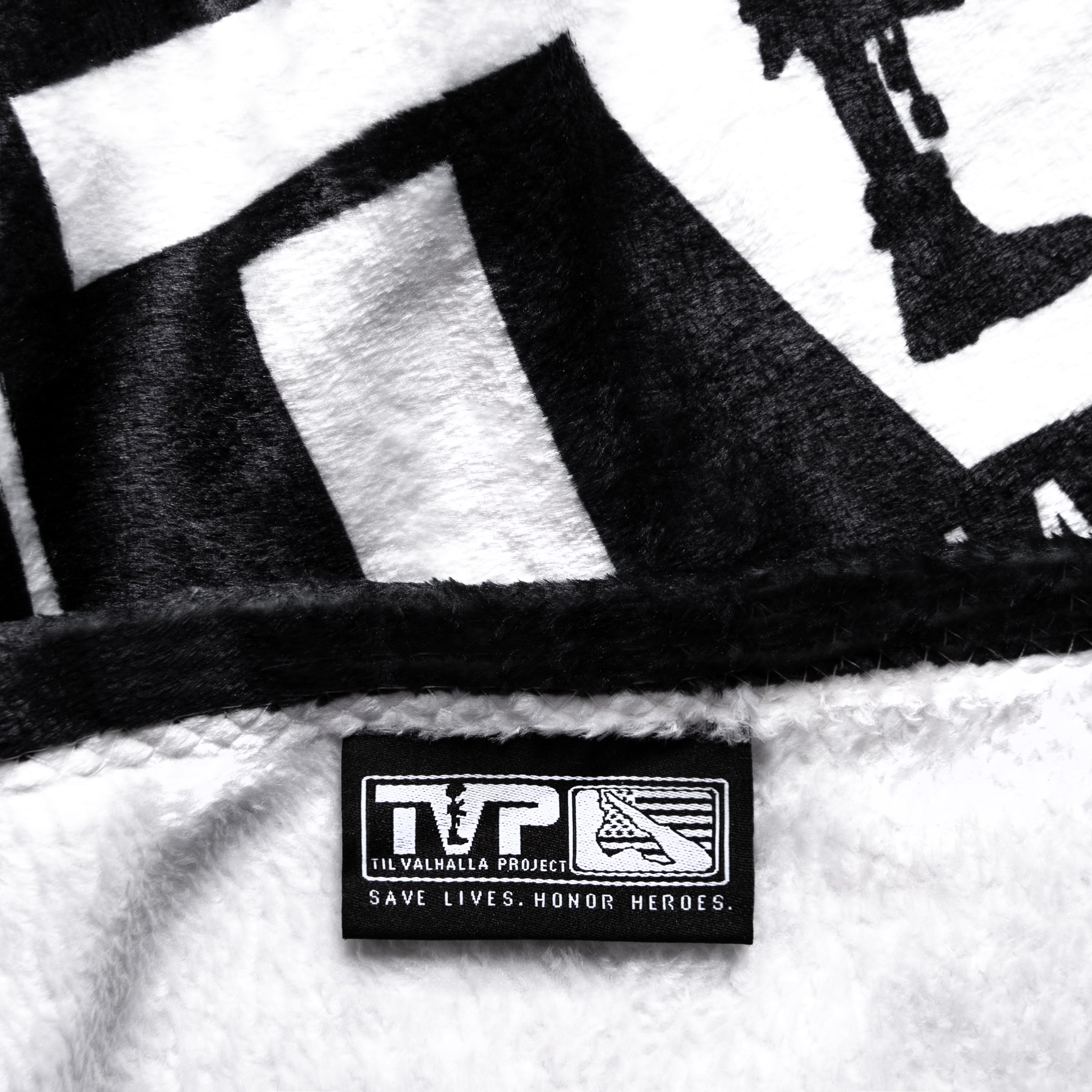 T.V.P. Throw Blanket