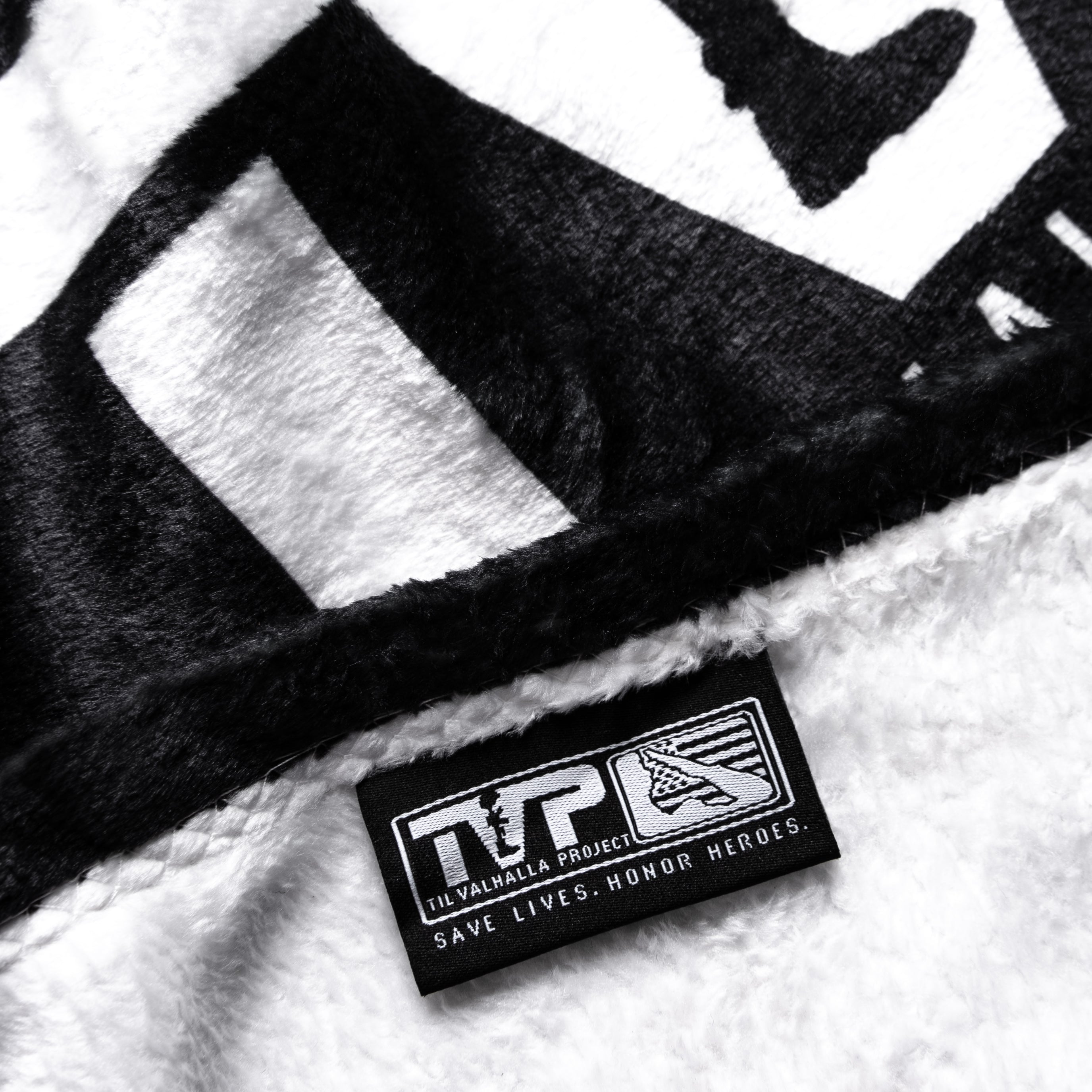 T.V.P. Throw Blanket