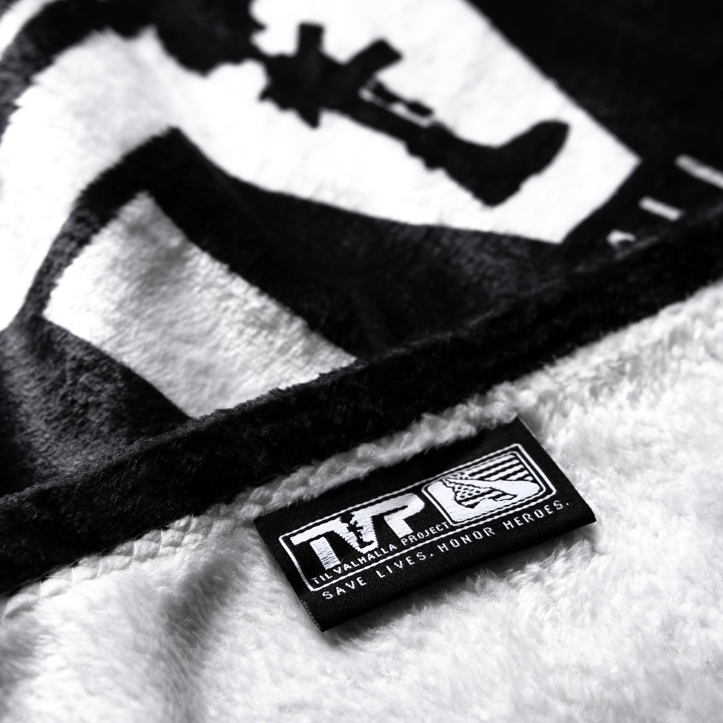 T.V.P. Throw Blanket